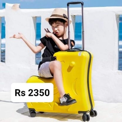 Picture of Kid travel on suitcase