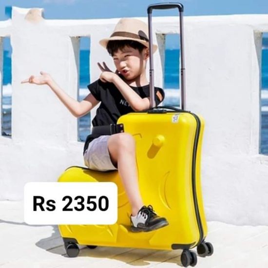 Picture of Kid travel on suitcase